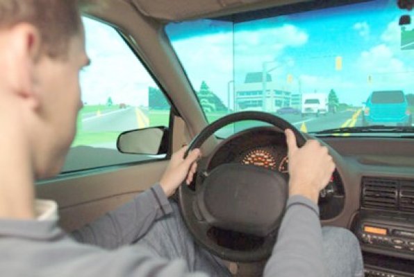 Prins la volan cu permis de conducere falsificat